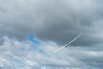 glider climbing under cloudy sky,  New Zealand