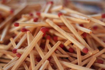 Spattered matches on a wooden table
