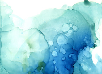 Abstract blue spots alcohol ink stains blots on a black background. Magical backgrounds