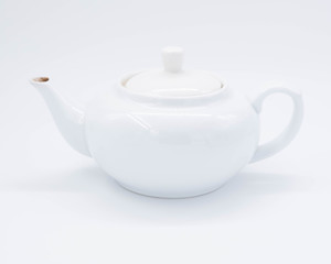 teapot and tea on white  background, over light
