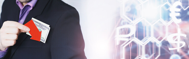 Financial crisis. Concept. Money bills in hand. Arrow symbol of the fall of the national currency. The change in the exchange rate between the Russian ruble and the US dollar.