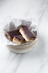 Sugar free vegan chocolate sticks with coconut and dates