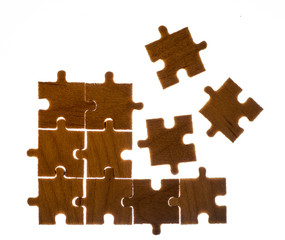 Wooden puzzle and backlight background