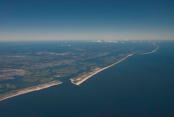 The Rockaway peninsula in Queens, New York from the air separating Jamaica Bay from the Atlantic Ocean