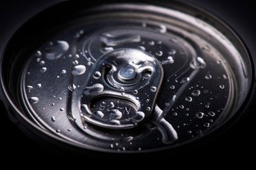 Closeup aluminum drink can with water drops