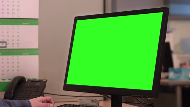 Monitor with chromekey in the office. Alpha channel on the office monitor

