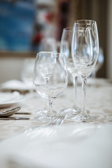 Serving the dining table in the restaurant. Empty glass.