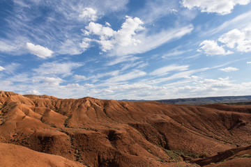 baguty red sand mountains tourist attraction with cloudy sky near Almaty, Kazakhstan