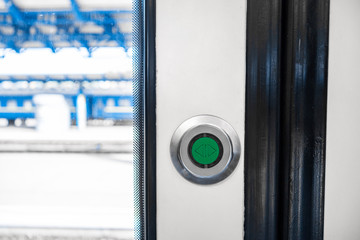 Button for opening doors in public transport