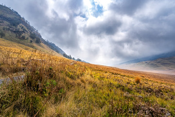 Aerial view of Sea of sand area around Mount Bromo, is an active volcano and part of the Tengger massif, in East Java, Indonesia. Famous travel destination backpacker in south east asia