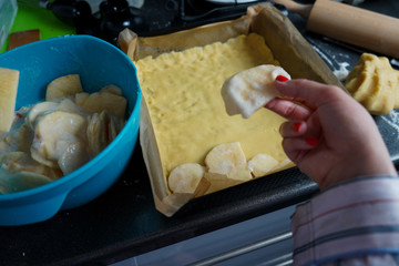 Making apple pie at home. Homemade pie at home. Baking during quarantine