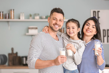 Family drinking milk at home
