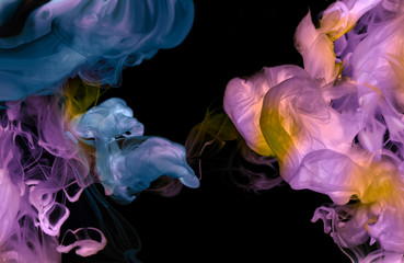 Acrylic colors in water. Abstract background.