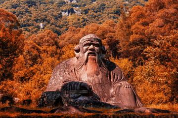 Laozi statue on Qingyuan Mountain, Quanzhou, China. 1,000-year-old Taoist stone carvings.