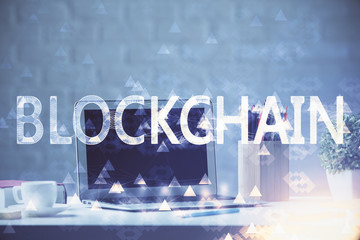 Multi exposure of blockchain and crypto economy theme hologram and table with computer background....