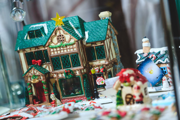 Christmas toy house with a green roof