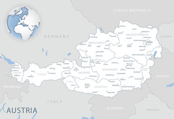 Blue-gray detailed map of Austria and administrative divisions and location on the globe. Vector illustration