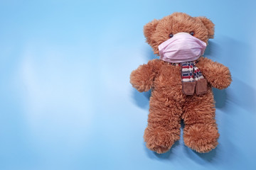 Teddy bear wearing mask, ideas concept for parents to convince children to wearing mask to protect...