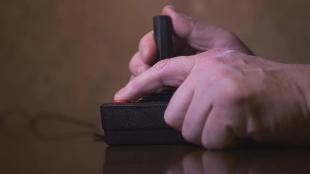 Playing With TV Video Game Console Joystick. 4K Footage