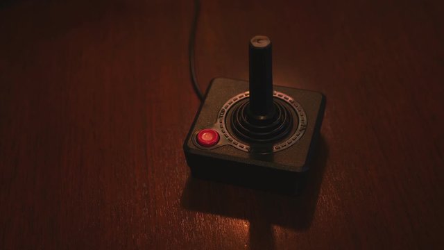Close-Up Of Vintage Video Computer Console TV Game Joystick