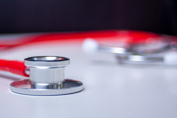 Red Stethoscope on White by orcearo. Isolated Red Stethoscope on White Background