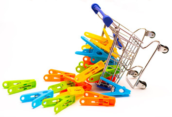 linen clips fell out of a wheeled basket that tripped