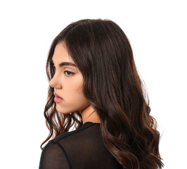 Naklejka premium Young woman with beautiful curly hair on white background