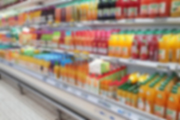 Naklejka premium Blurred of shelf of product inside supermarket or blurry of department store or blur of shopping mall interior use for your background, pattern, design or your concept.