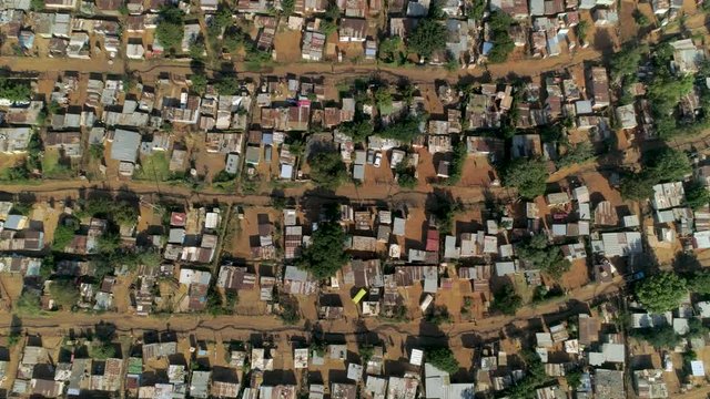 Aerial view of an informal settlement in Soweto, South Africa. Also known as a squatter camp or shanty town, these settlements are characterised by impoverished communities living in shacks. 