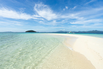 Beautiful amazing nature background. Tropical island with sandbar in Coron, Philippines.