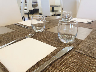 Simple table setting in a restaurant.