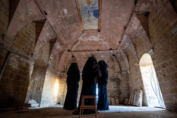 Ghosts installation in an old farm in Puglia (Puglia), Italy