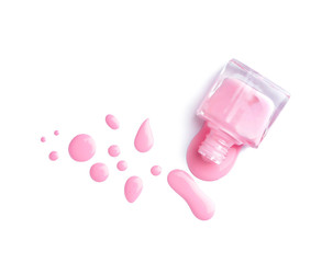 Spilled nail polish on white background