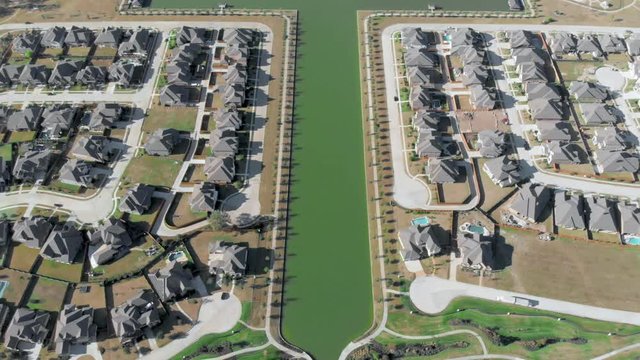 Towne Lake subdivisions aerial view. Aerial view of a peaceful neighborhood in Cypress Texas. Drone footage of new house in Houston, Texas. Aerial view of a luxurious residential. Wide Shot
Drone shot