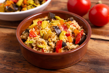 Cous cous with vegetables. oriental recipe that adapts to the characteristics of a vegan and vegetarian dish. Summer food, summer lunch.