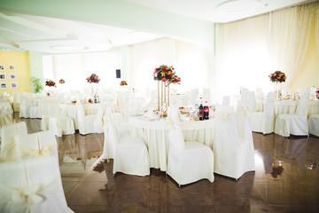 Interior of a restaurant prepared for wedding ceremony