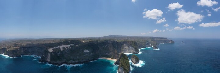 Fototapeta premium Aerial view of Manta Bay or Kelingking beach on Nusa Penida Island, Bali, Indonesia.