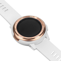 Wireless smart watch in a round matte gold case with numbers on the rim and a silicone strap on a white background. Diagonal view