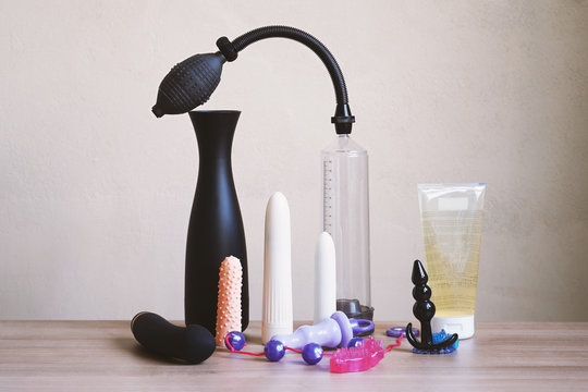 adult sex toys for women and men - assortment of dildo vibrator anal plug beads penis pump and lube
