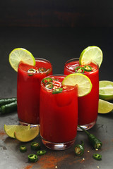 Jalapeno tomato margarita cocktail with lime