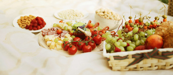 Assorted Italian food set. Delicious snack on party or picnic time. Italian style banquet. Top view. Banner for website