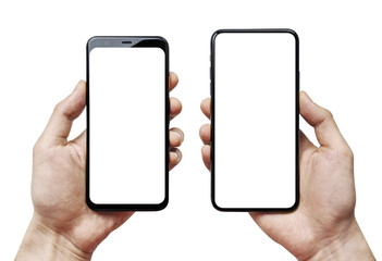 Man hand comparing two new smartphone. Isolated on white background