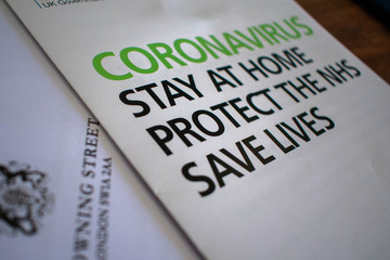 Close up image of Corona Virus Stay at Home Protect the NHS Save Lives UK government advice