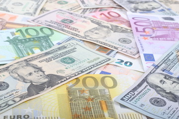 many dollar and euro banknote as background.