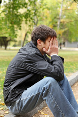 Obraz premium sad young man