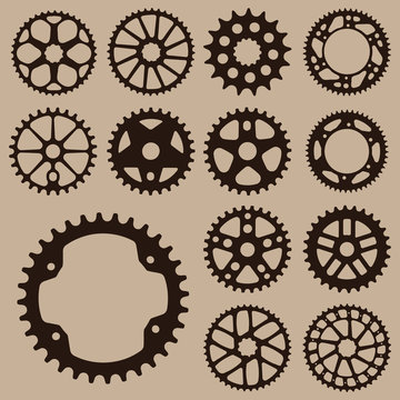 Set of gears. Gear wheel collection. 
Bicycle gear cogwheel sprocket symbols chain wheel. Group of gears. Bicycle crank vector collection.