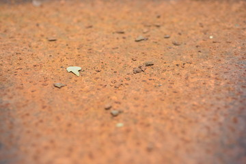 Rust that clings to the hull of the old car. Use as wallpaper