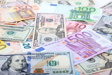 many dollar and euro banknote as background.