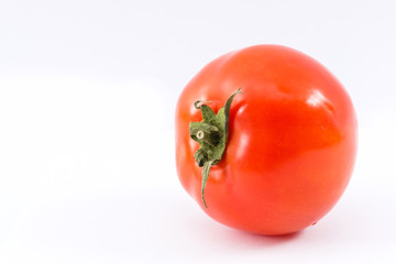 red ripe tomatoes isolated on white background