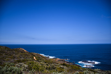 Fototapeta na wymiar The coast of the sea with clear blue sky background in Australia